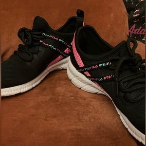 Black and pink slightly worn size 4 big girls Filas.